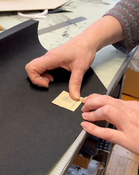 Hands of a craftswoman working with plant-based materials in the workshop – symbol of honest, sustainable design and conscious vegan fashion by Plant Inside