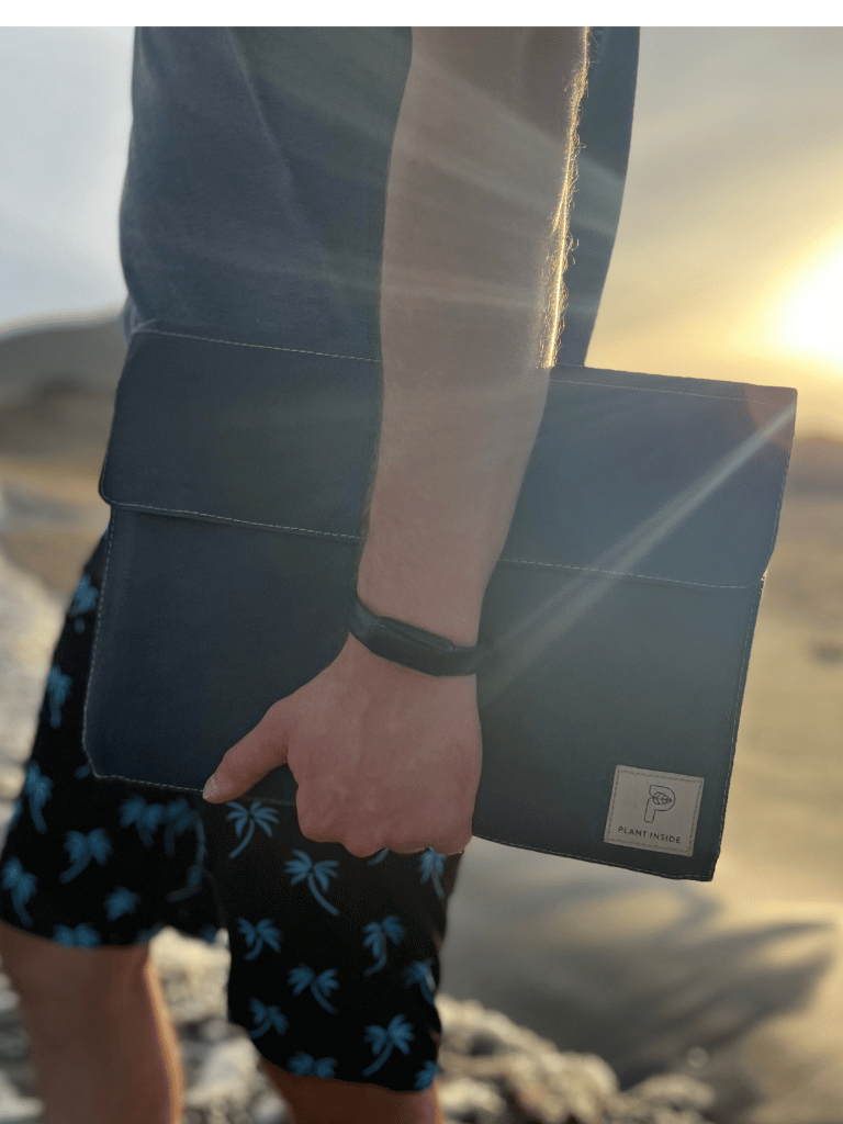 Slim navy blue vegan sleeve designed for 14-inch MacBook or similar laptops