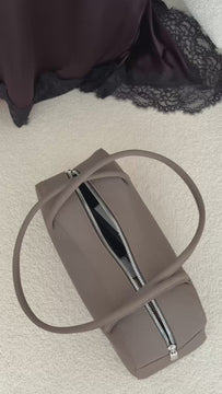 Dark Brown Nubuck vegan baguette bag by Plant Inside – see what fits inside: camera, sunglasses and cosmetics. Plant-based Viridis® leather, handcrafted in Poland.