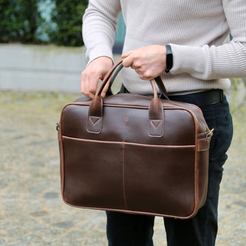Dark Brown Matt vegan laptop bag by Plant Inside – plant-based Viridis® leather, handcrafted in Poland. Shown in motion and close-up detail.